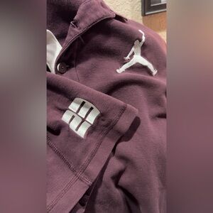 Nike Jordan Team men's golf polo shirt in a burgundy color